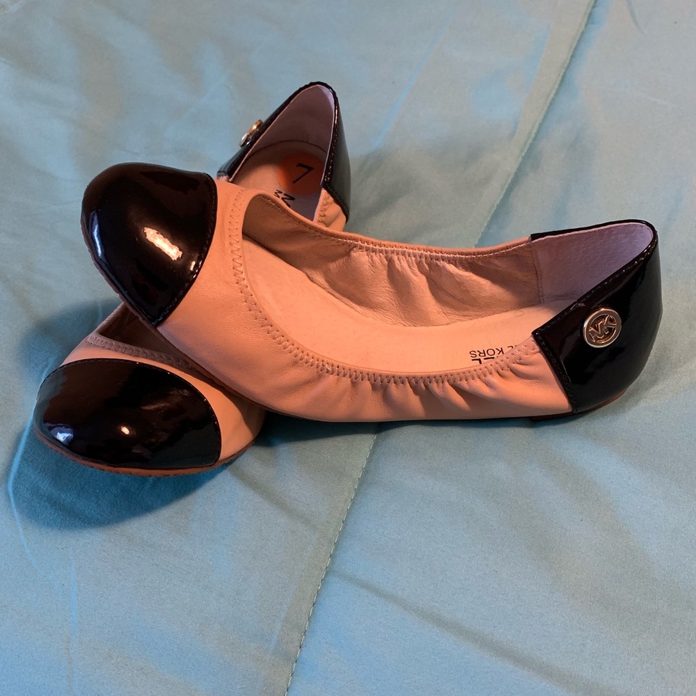 Michael Kor’s casual flats.